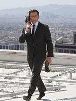 Maxwell Smart talking on his show phone